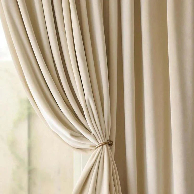 Beige blackout curtain with elegant drape and tieback, soft fabric window treatment for modern home interiors