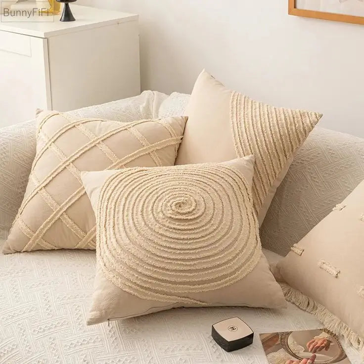 Set of beige textured throw pillows with geometric and circular patterns, cozy decorative cushions for sofa decor