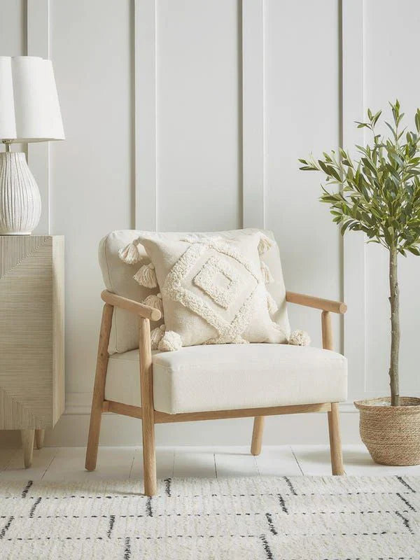 Beige accent chair with wooden frame and textured cushion, minimalist living room furniture in neutral home decor